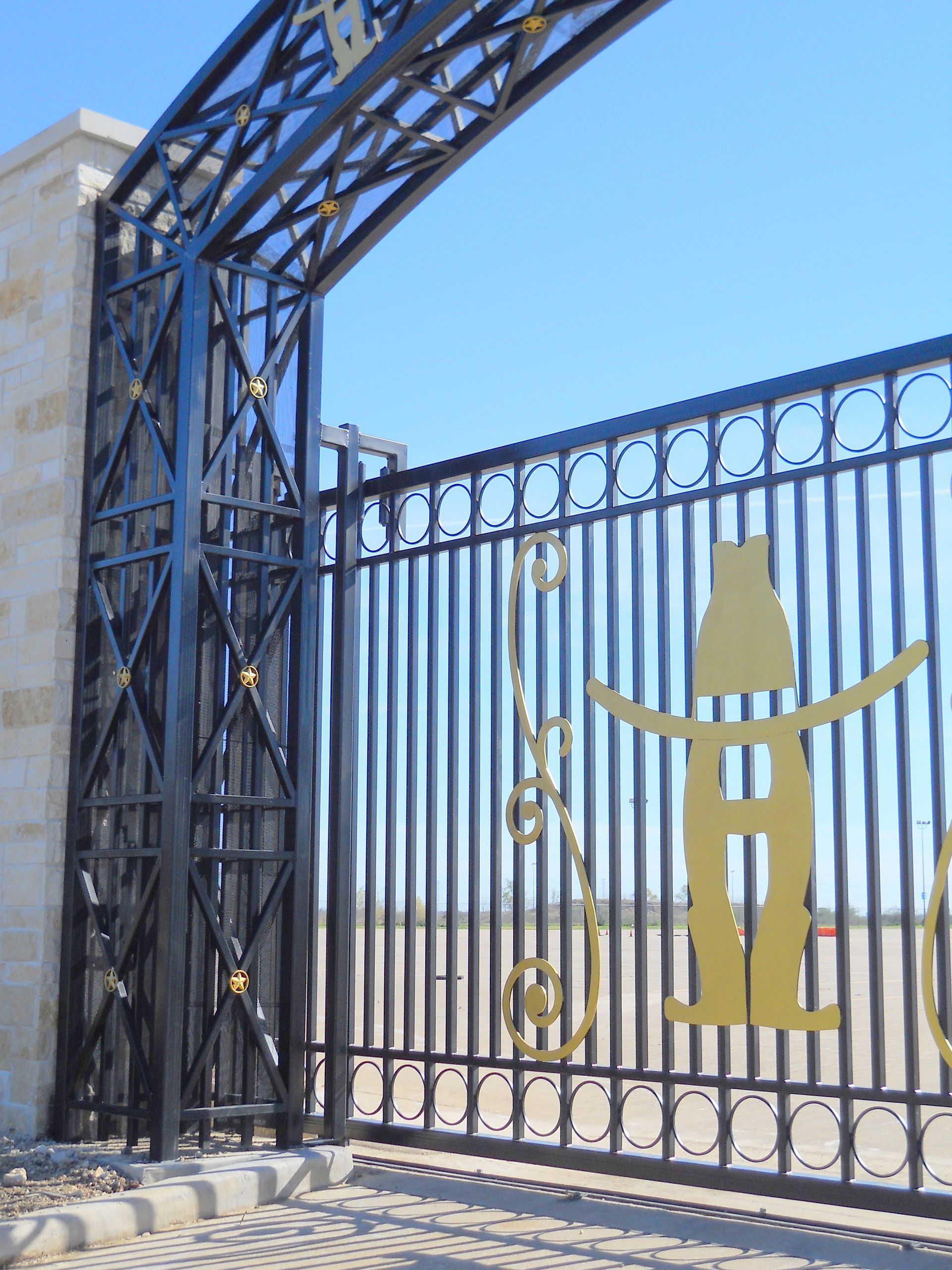 A fence with a picture of a cowboy on it