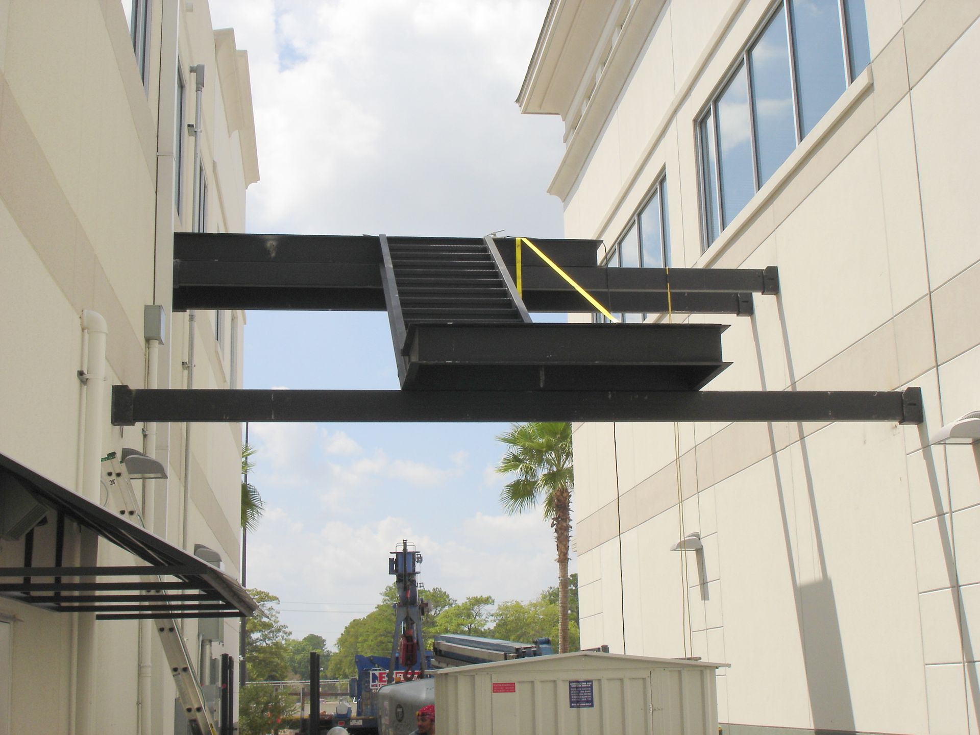 A staircase is being built on the side of a building