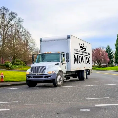 White moving truck on an Oklahoma City road, with 
