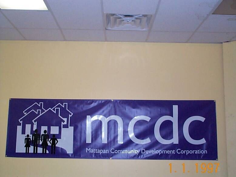 A purple sign that says mcdc on it