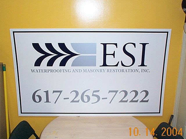 A sign for esi waterproofing and masonry restoration inc.