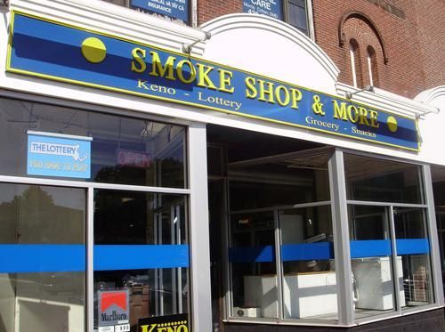 A smoke shop and more is located in a brick building