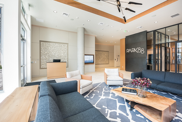 Photo of the lobby showing the front entrance and a sign that reads