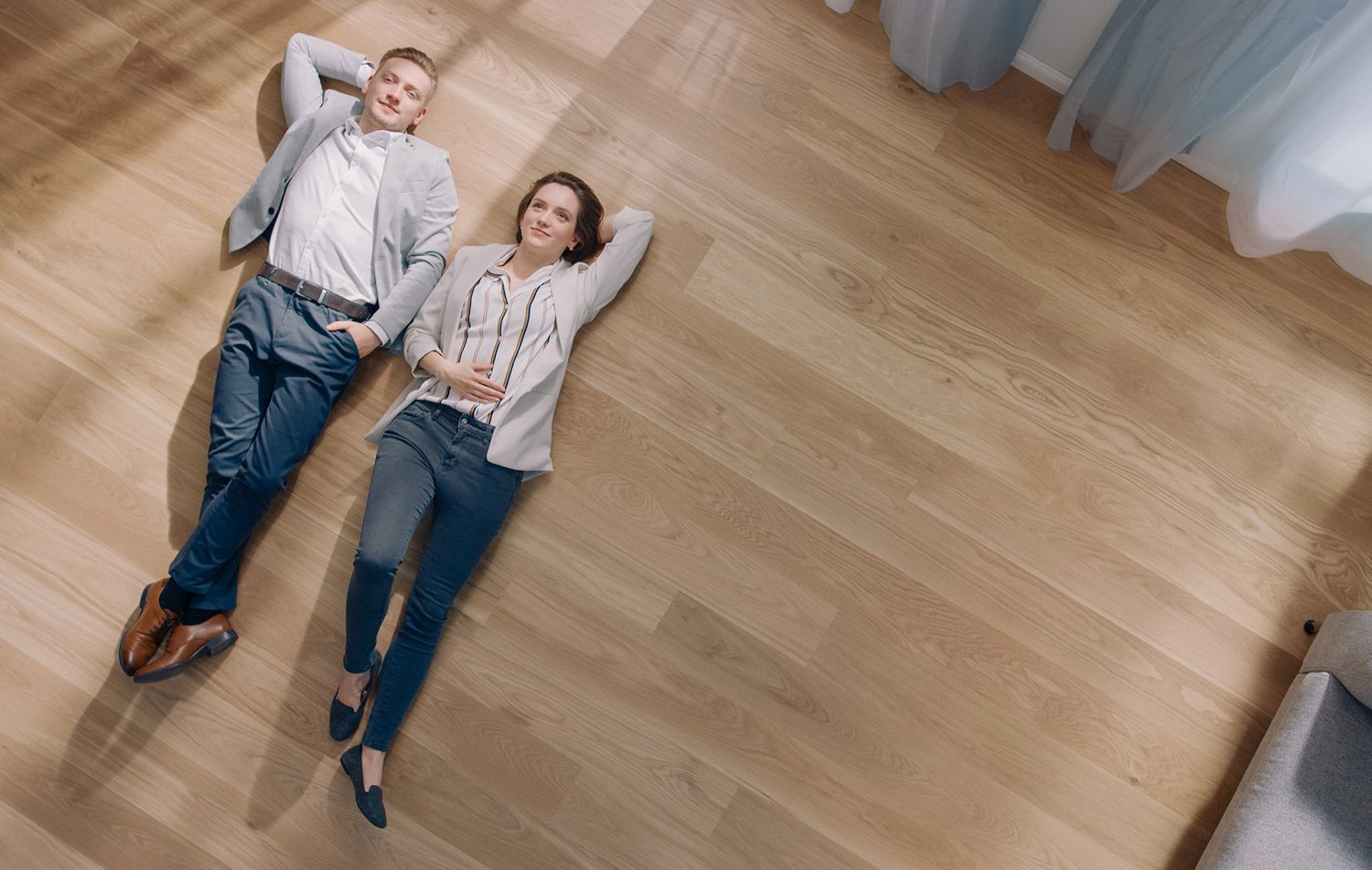 Couple Laying on Floor — Haubstadt, IN — Floor It 41