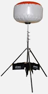 A light balloon is sitting on top of a tripod on a white background.