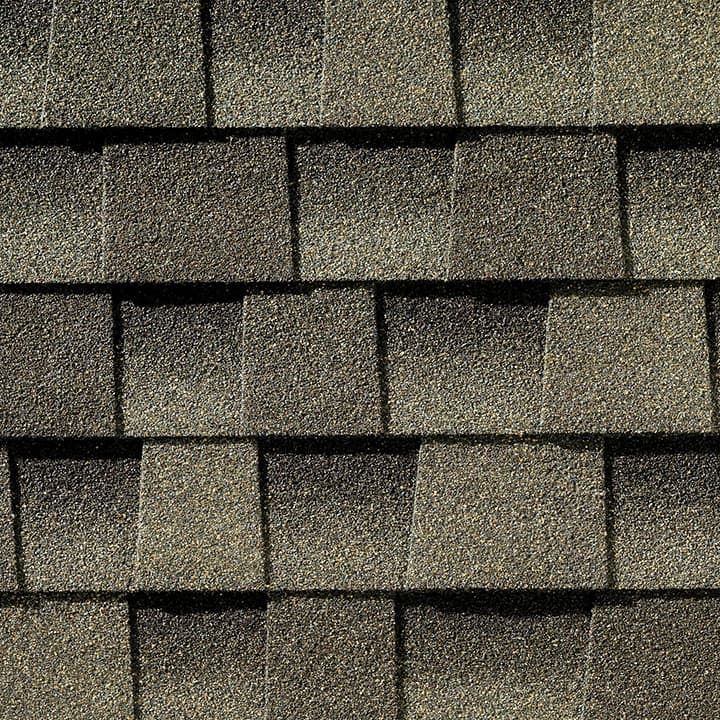 a close up of a row of shingles on a roof .