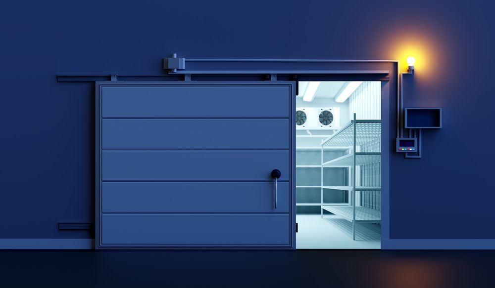 Sliding Door of a Walk-in Freezer — Cool Tropics Air Conditioning & Refrigeration in Mourilyan Harbour, QLD