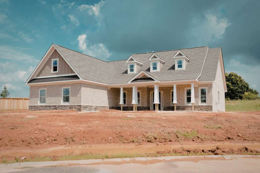 brick home on house pad
