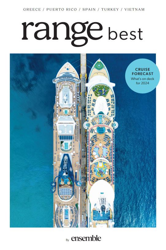 A magazine cover with two cruise ships on it.