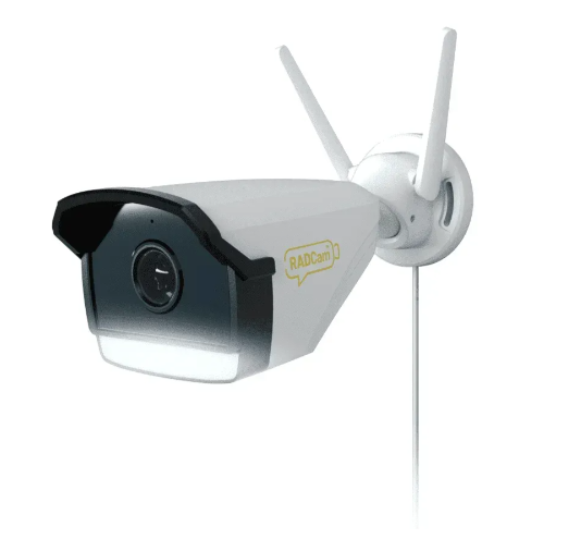White outdoor security camera with two antennas mounted on a wall, angled slightly.