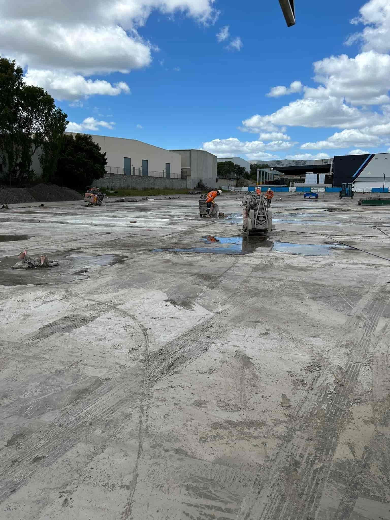 A concrete cutting machine is cutting concrete on a construction site. — Newcastle Cut N Drill Pty Ltd In Boolaroo, NSW