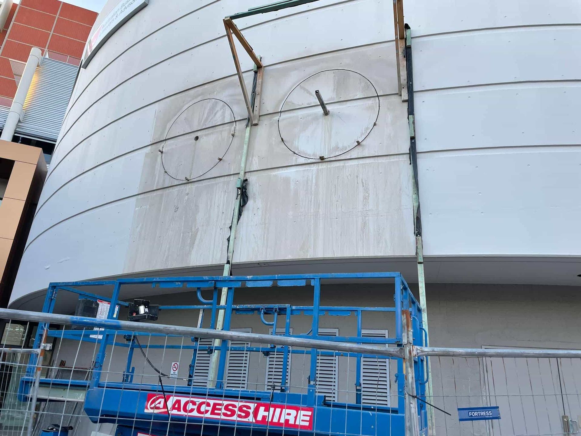 A large building with a sign that says access hire — Newcastle Cut N Drill Pty Ltd In Boolaroo, NSW