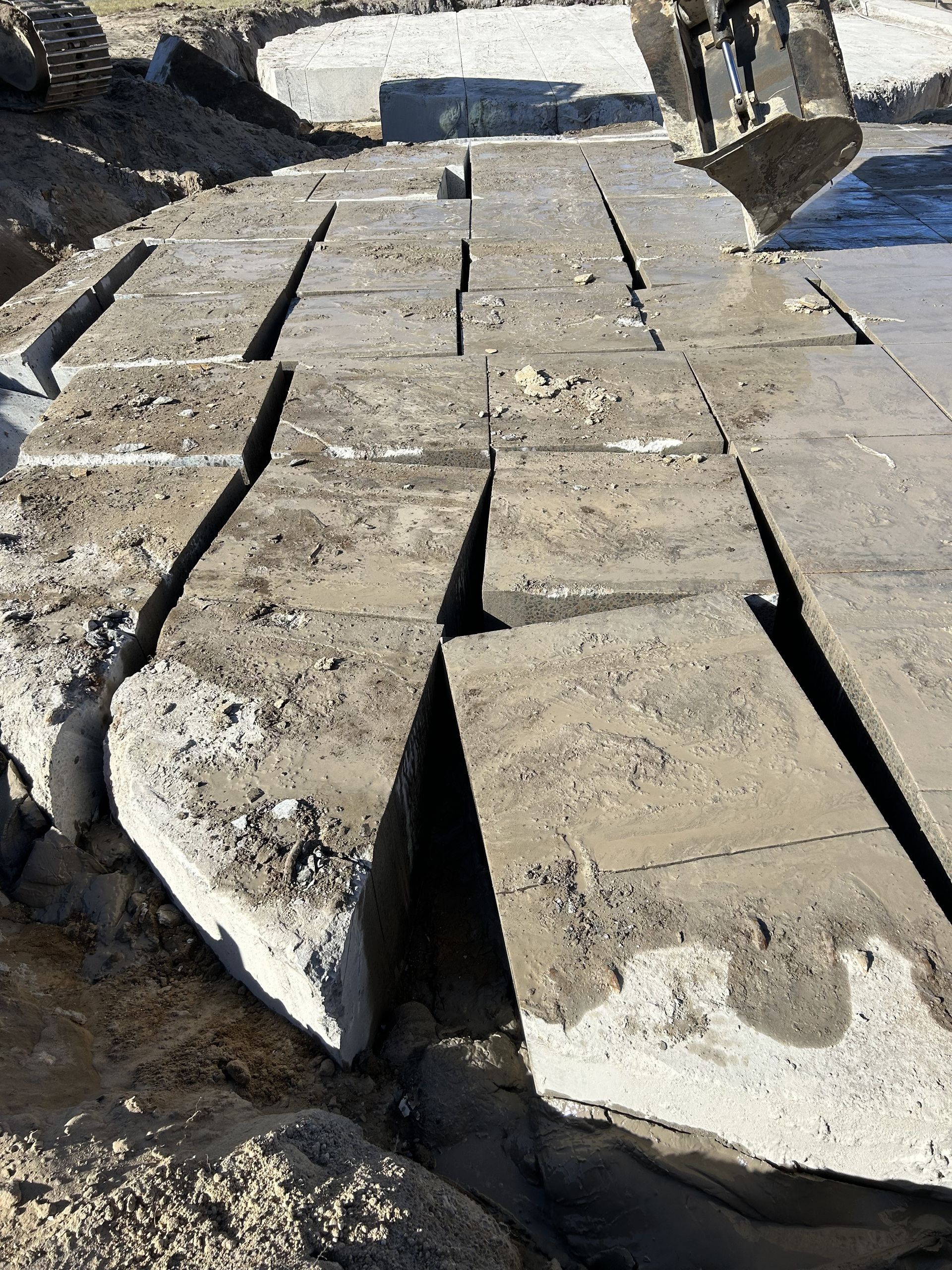 A Concrete path cut up and ready for removal— Newcastle Cut N Drill Pty Ltd In Boolaroo, NSW