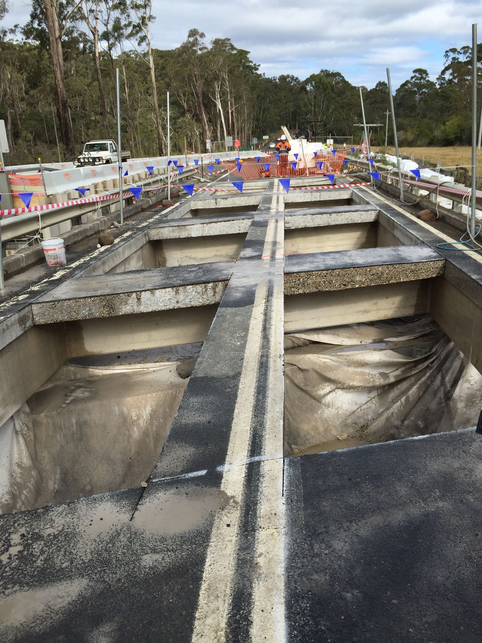 A Bulldozer Is Demolishing A Building With A Pile Of Bricks — Newcastle Cut N Drill Pty Ltd In Boolaroo, NSW