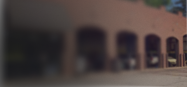 Building with arched entryways. | Top Quality Car Care