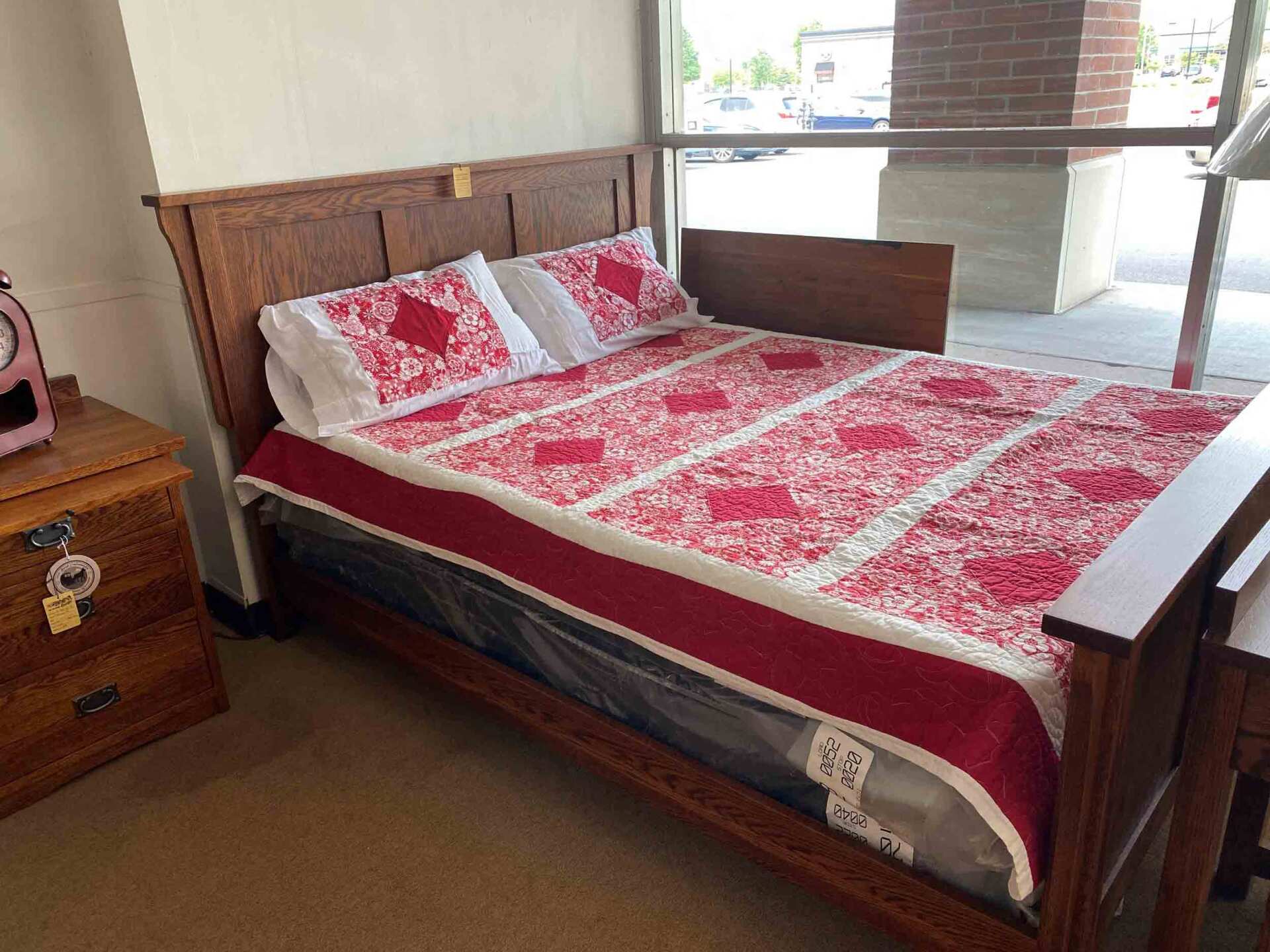 Bed with red blanket — Livonia, MI — Chris Furniture