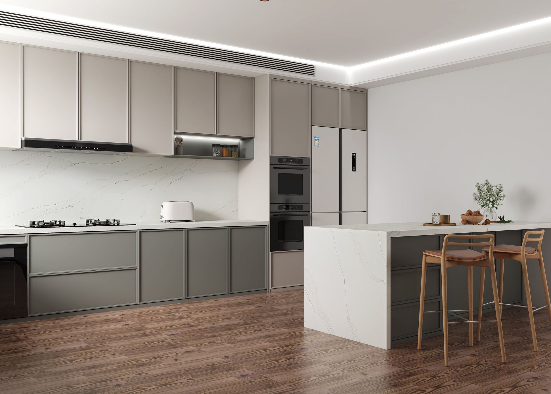Modern kitchen with gray cabinets, island with stools, and wooden floor.
