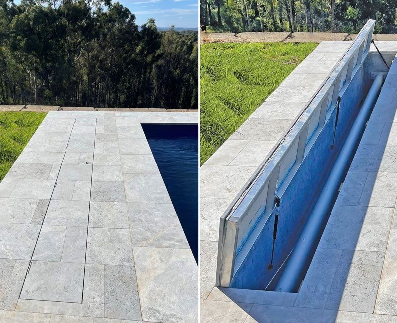 Pool cover in open and closed positions, surrounded by light gray stone tiles.