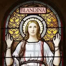 Stained glass of Saint Blandina with arms raised, from a Lyon church