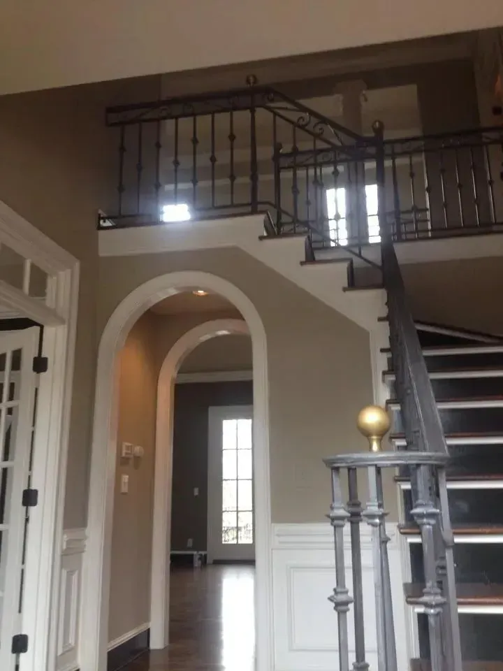 A staircase leading up to the second floor of a house