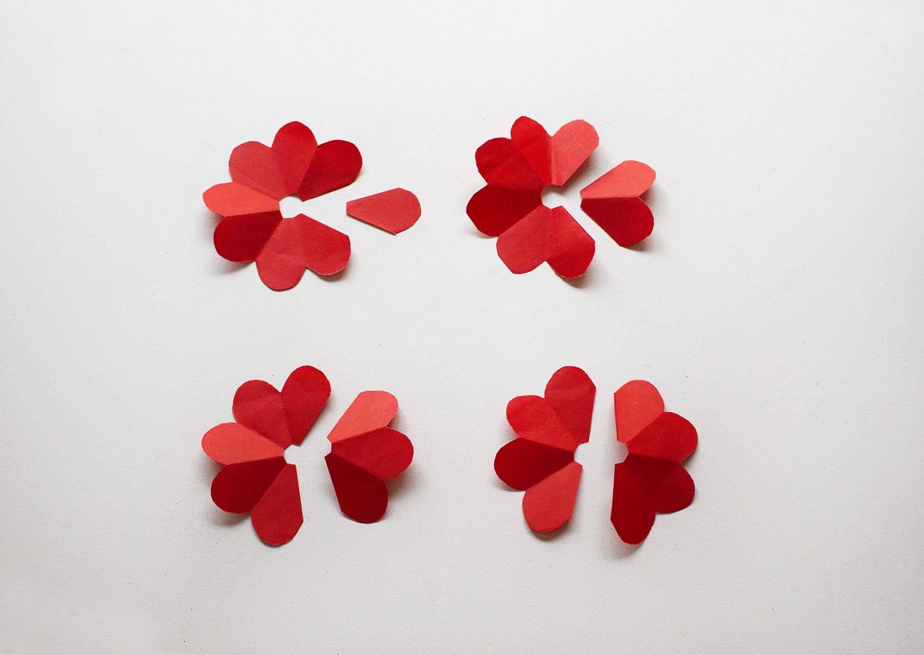 four cut rose paper flower petals