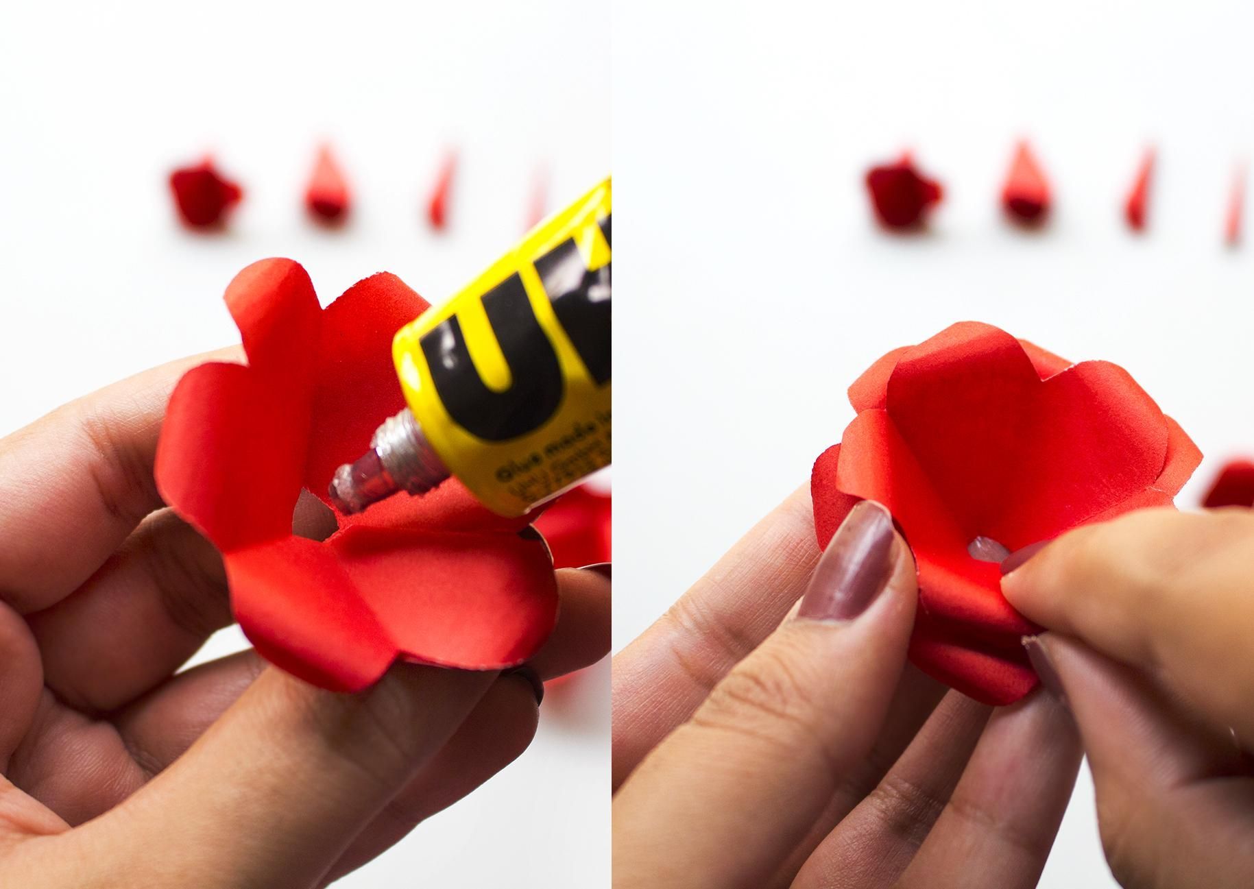 woman assembling paper flower