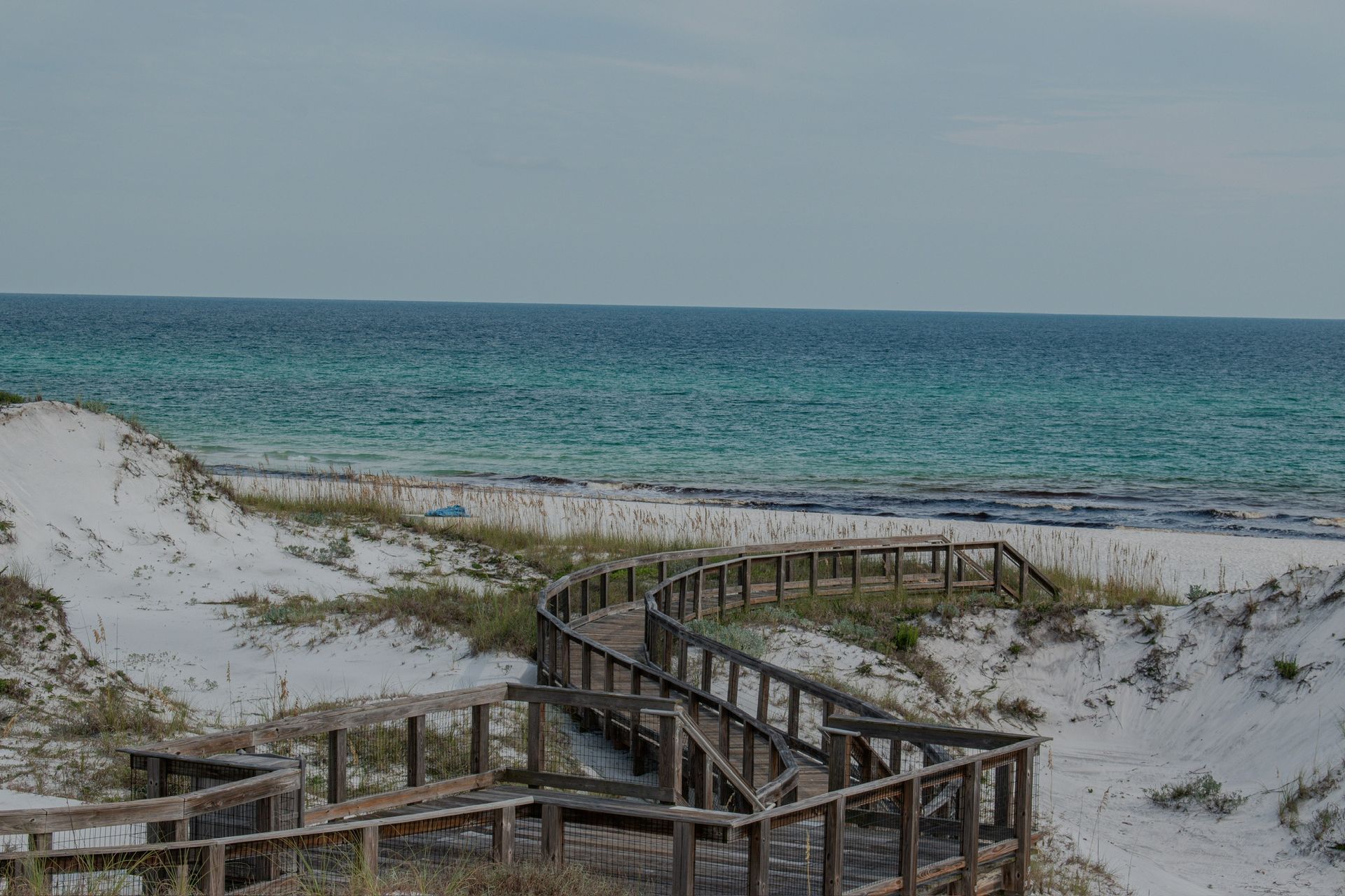 A kitchen with a large island in the middle of it.