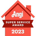 A red house with a red ribbon that says `` angi super service award ''.