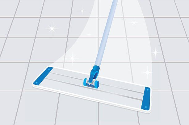 A blue and white floor mop cleaning a tiled floor, leaving a clean, sparkling path.