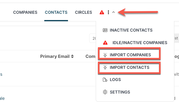 A screenshot of a company 's contacts page with an arrow pointing to the import contacts button.