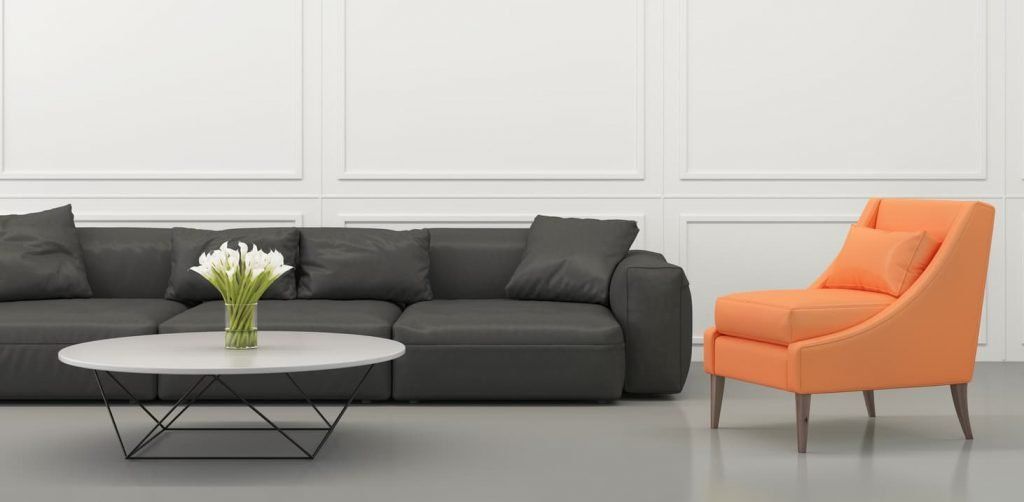 black sofa and orange chair
