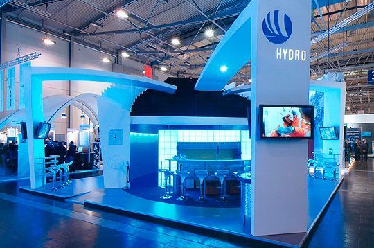 A blue and white booth with the word hydro on it