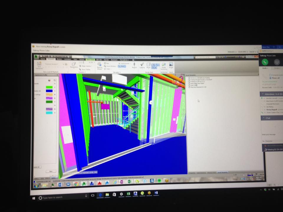 a computer screen shows a 3d model of a building