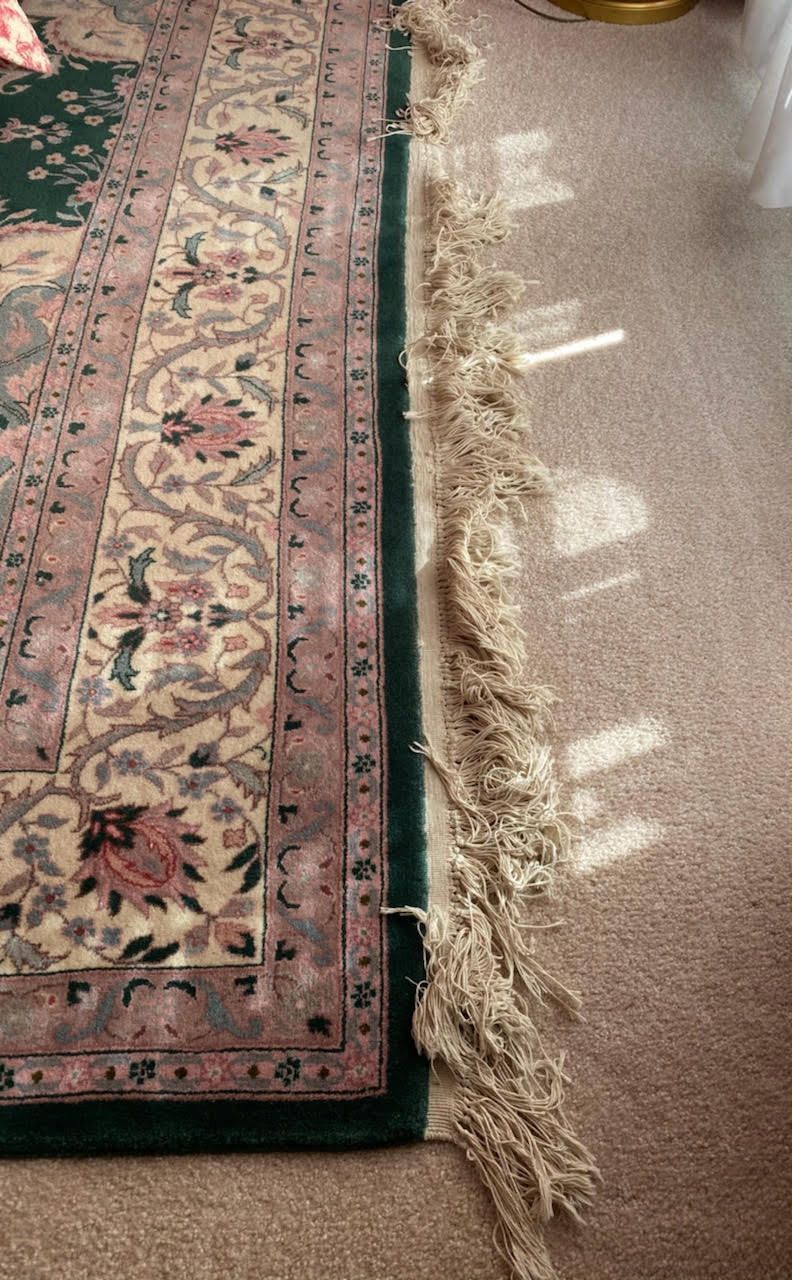 dirty rug fringe