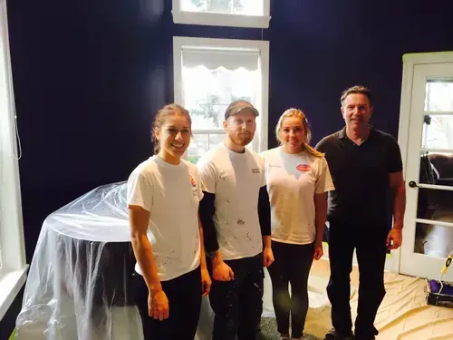 Paint buckets and brush used by our professionals