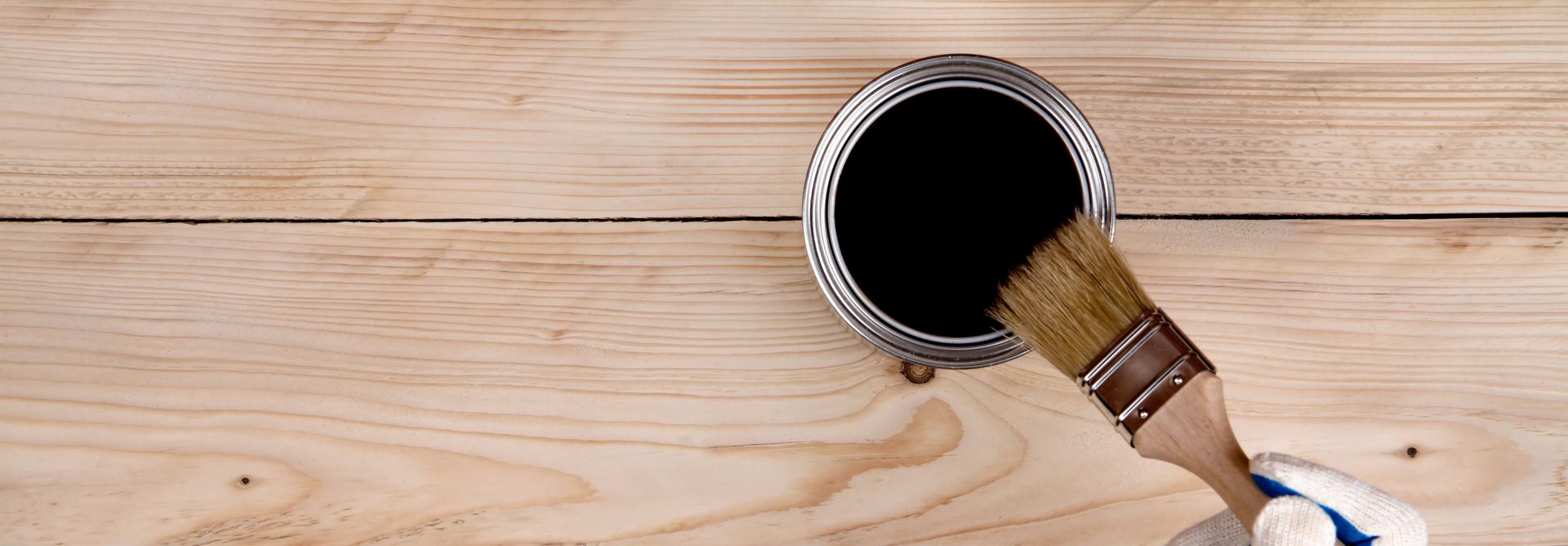 Freshly opened bucket of paint to be used in renovation