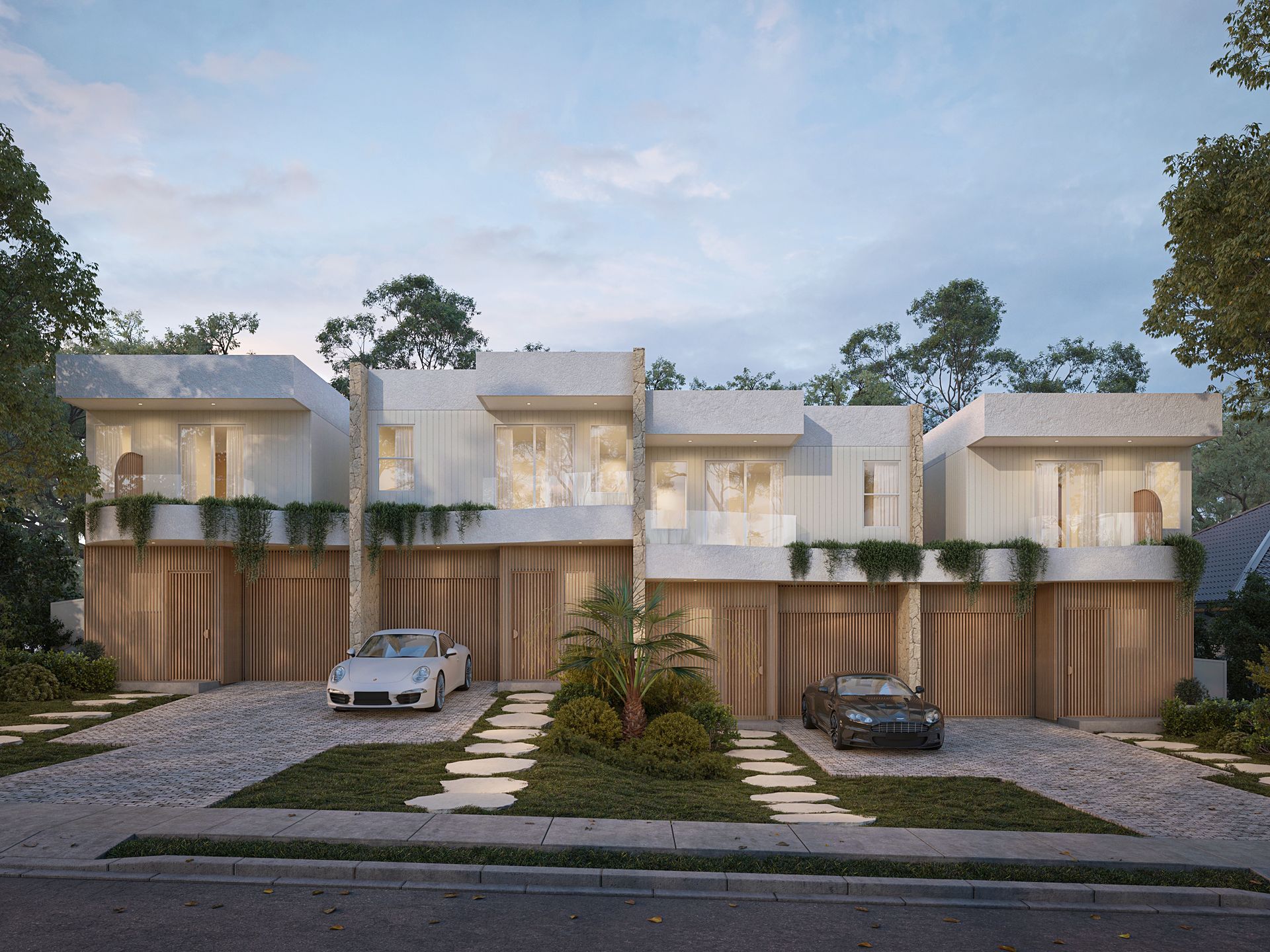 Modern townhouses with light concrete facades, wooden accents, cars parked in driveways, and landscaped yards — Gracia Building Design In Kiama, NSW