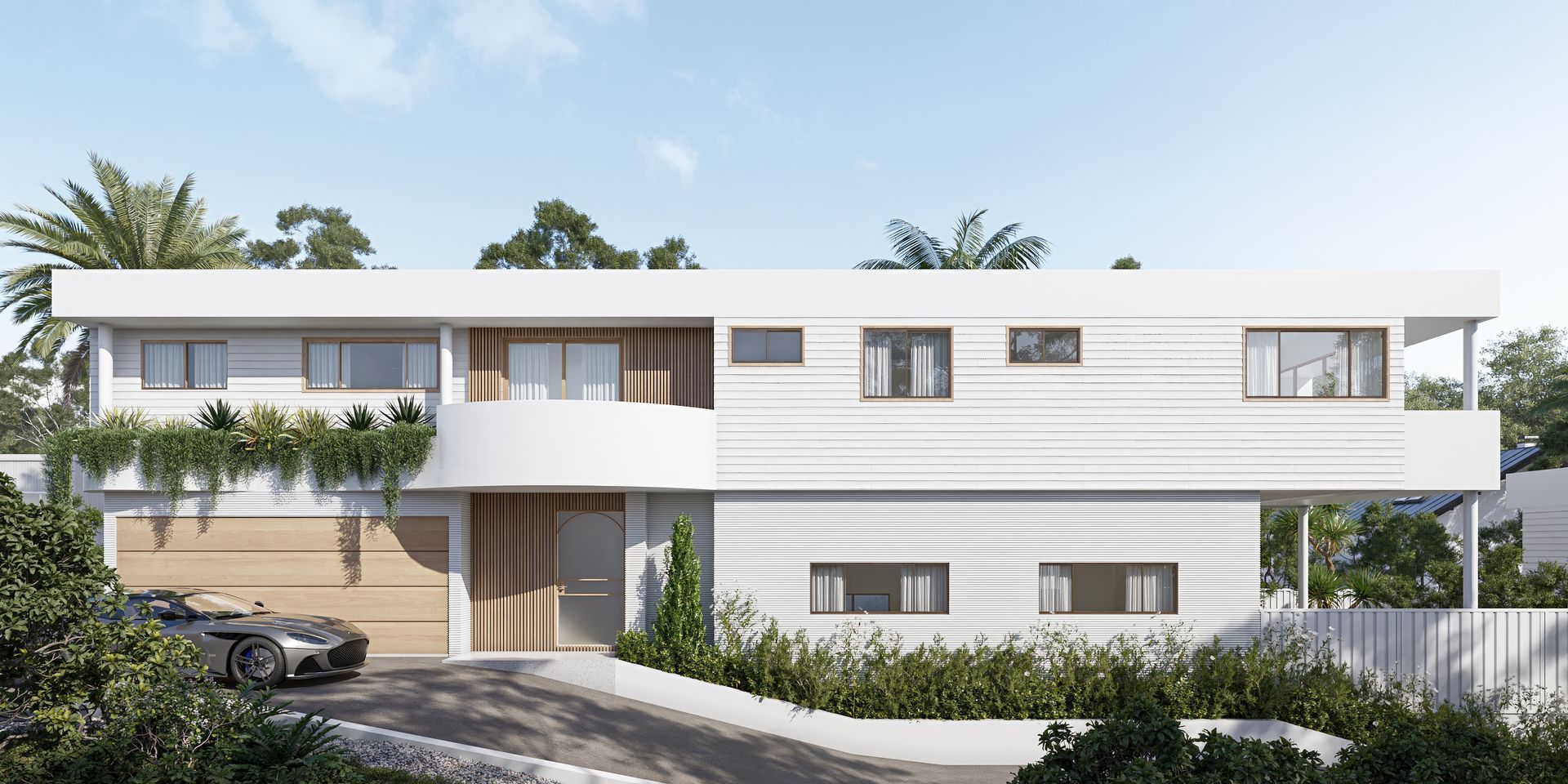 Modern white house with a car parked in front. Lush greenery and blue sky backdrop — Gracia Building Design In Kiama, NSW