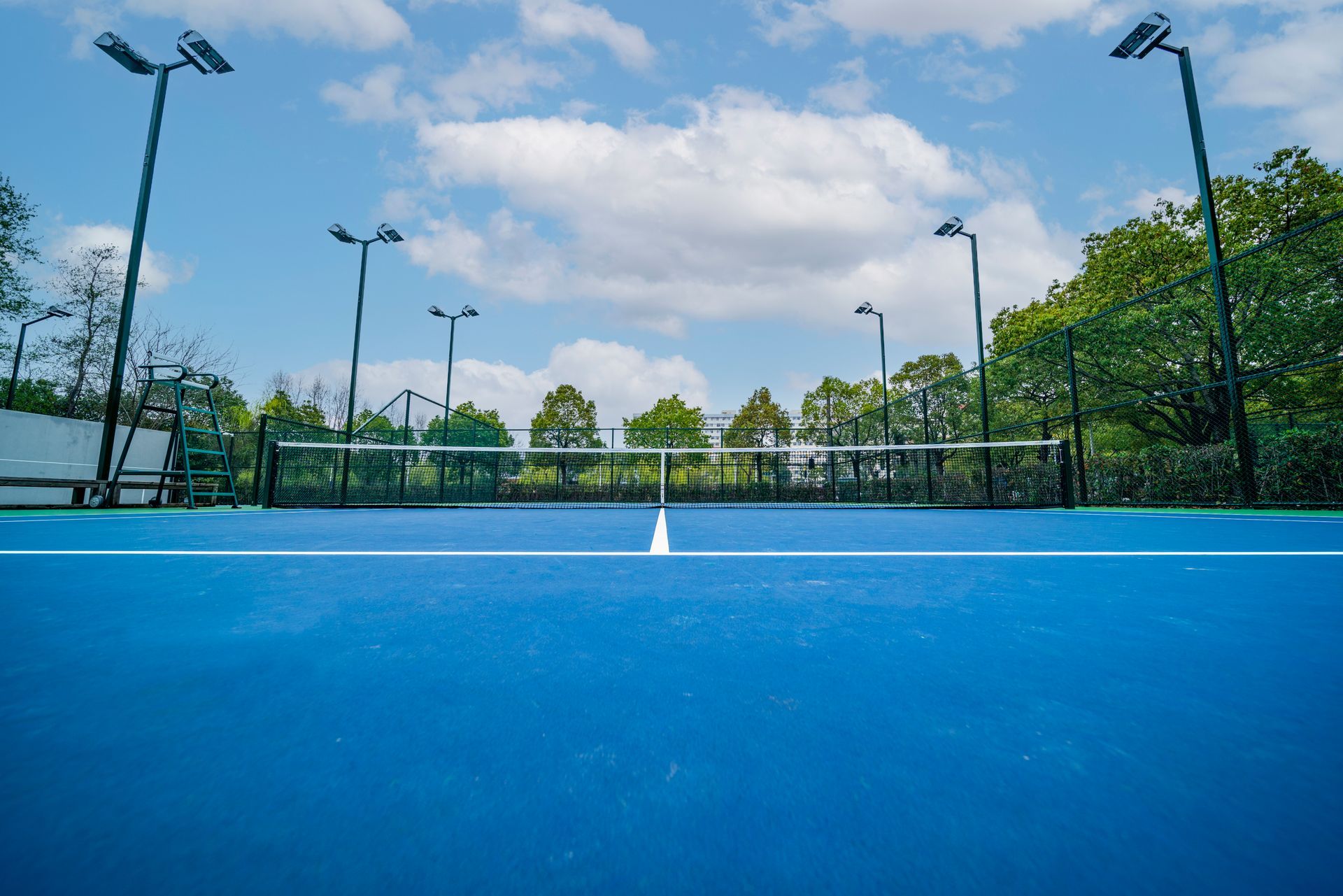 Empty blue tennis court — Pine State Asphalt — Windham, ME