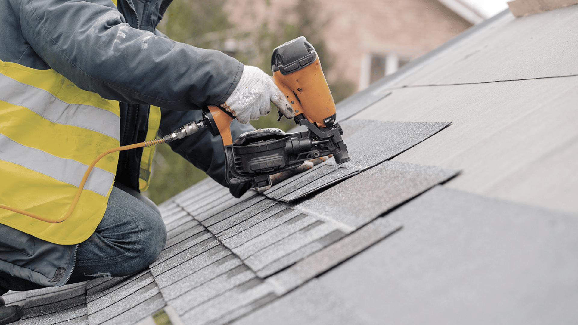 a man fixing a roof