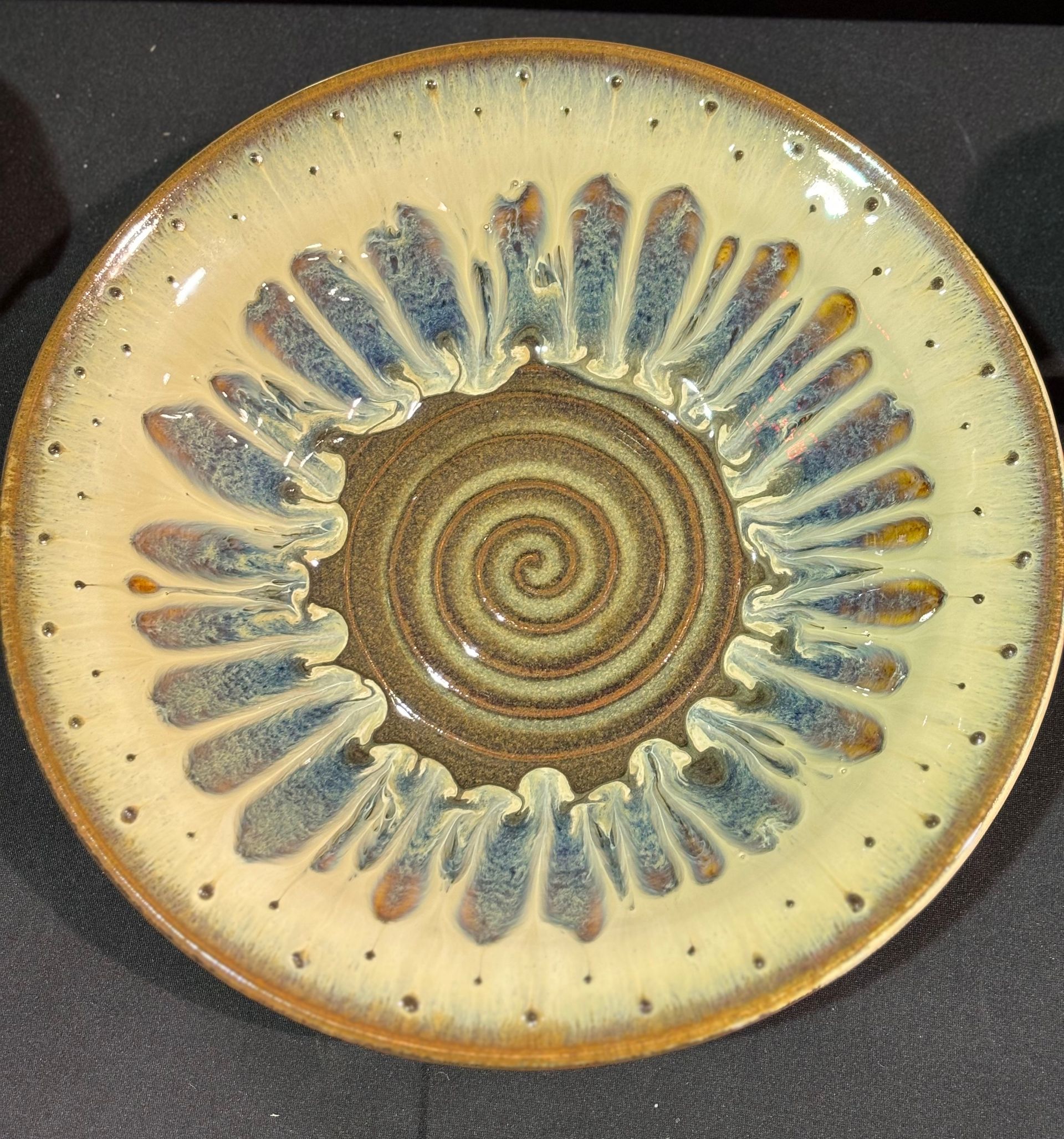 A plate with a spiral design on it
