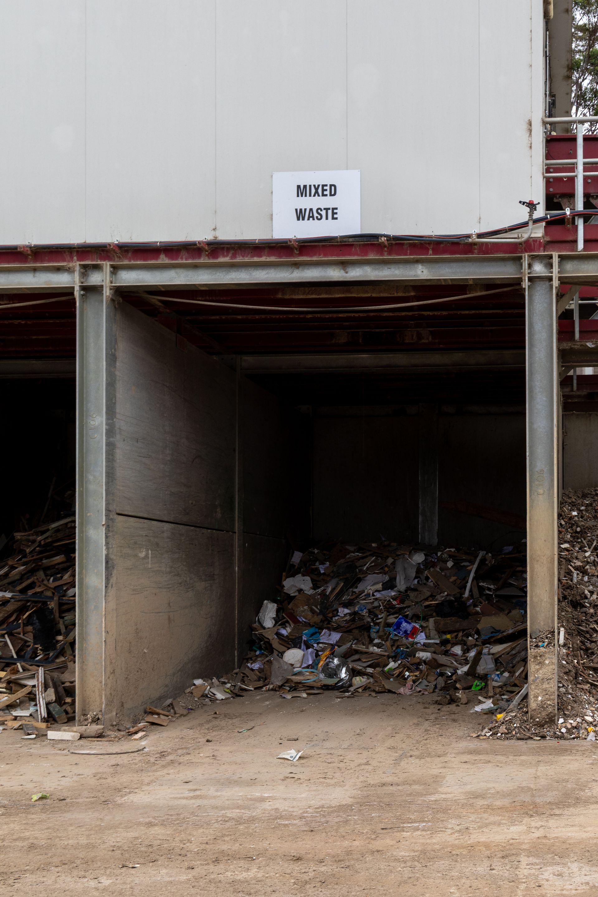Labelled Bins Are Filled With Mixed Trash — Economy Waste Group | Skip Bins Central Coast In Gosford, NSW