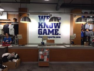 Checkout counter at a sports store with blue 