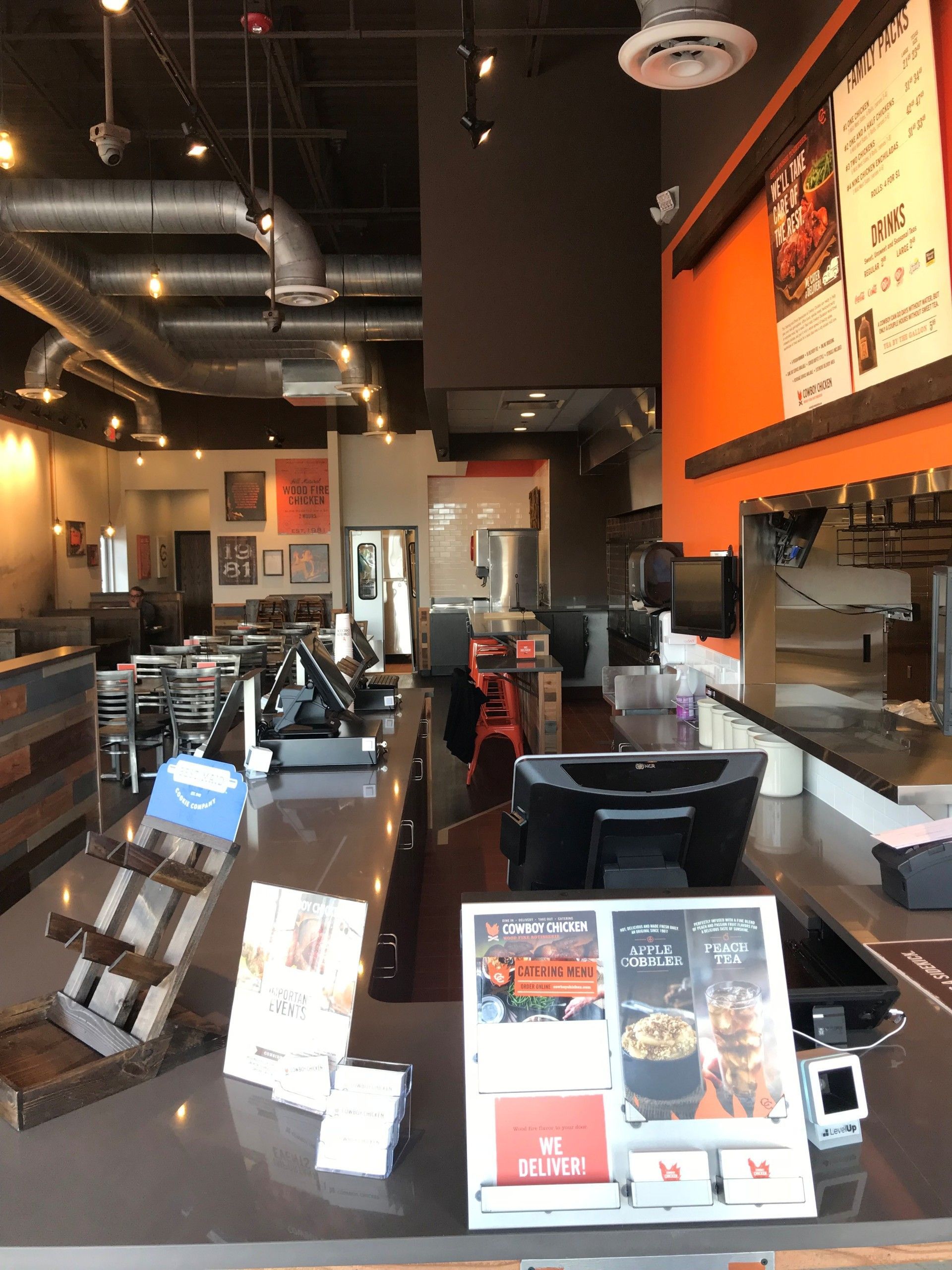 White Kitchen with Cabinets and Floating Shelves — Walnut Grove, MO — Big Rock Construction White Kitchen with Cabinets and Floating Shelves — Walnut Grove, MO — Big Rock Construction
