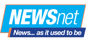 A blue sign that says newsnet news as it used to be