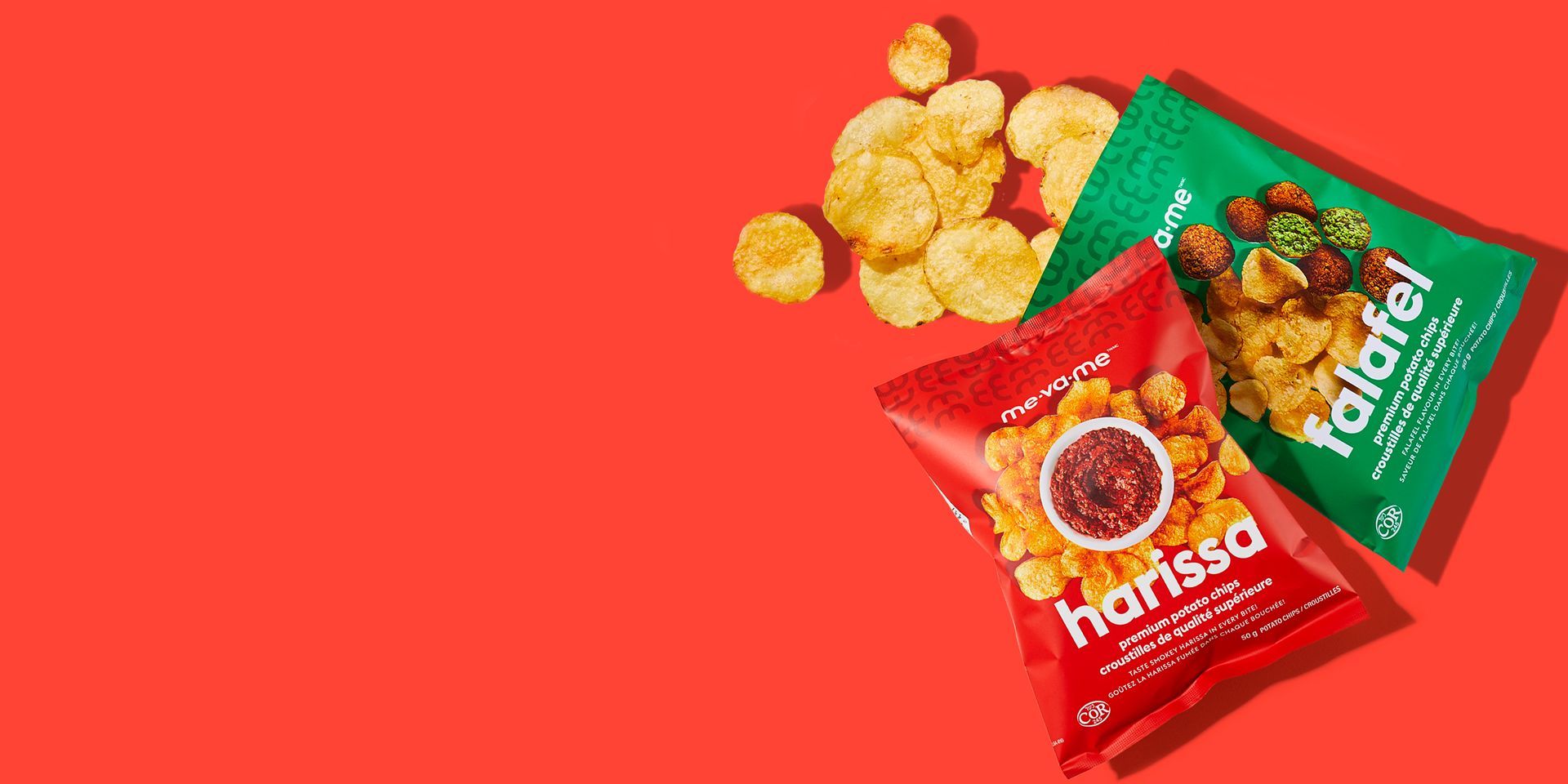 Two bags of food are sitting on top of each other on a red background.