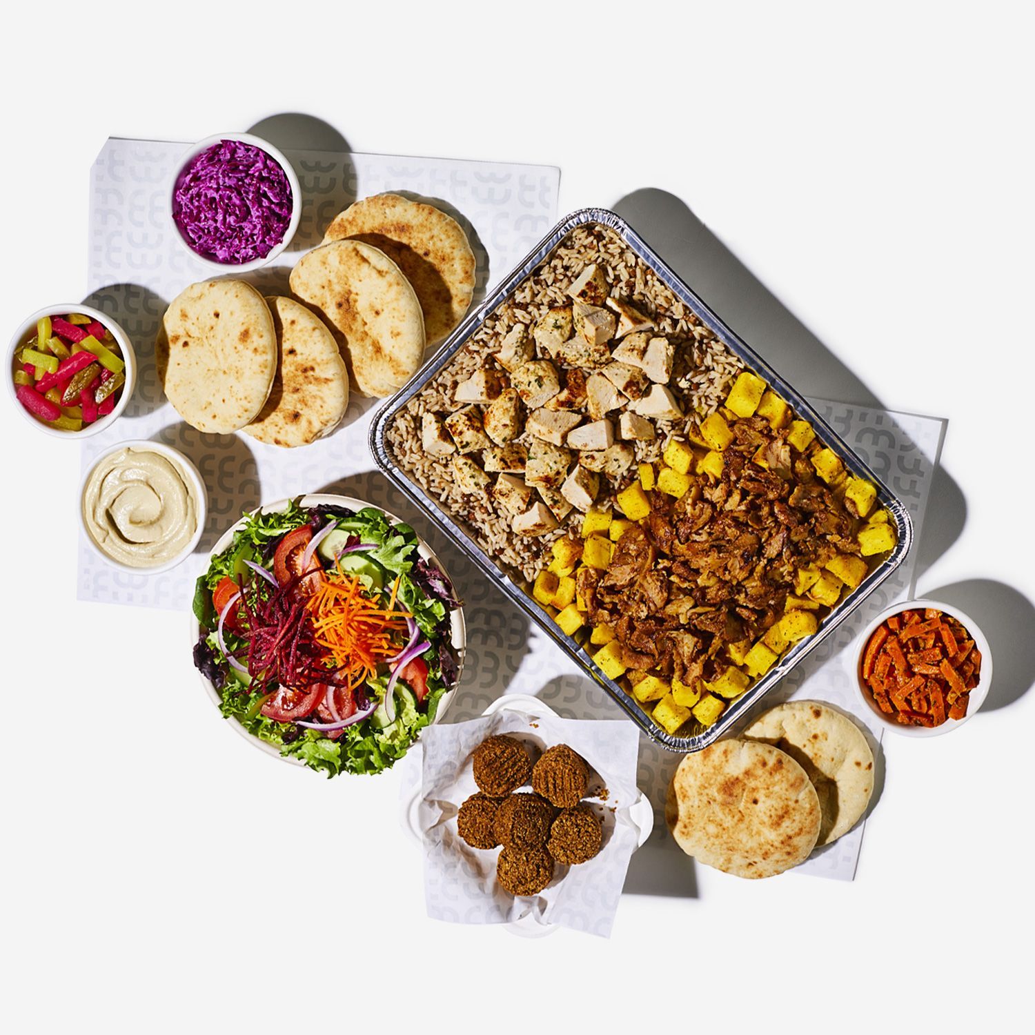 A variety of food is sitting on a table.