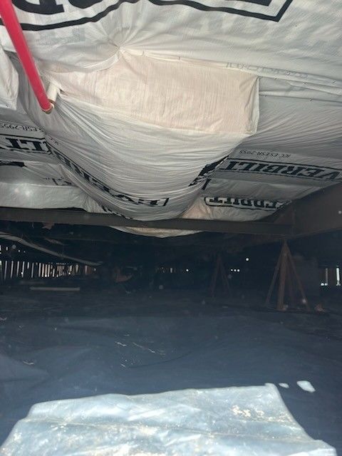 Trailer repair and , installed insulation and belly paper after photo