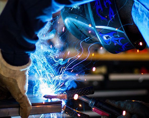 Close Up of a Person Welding a Piece of Metal — Mayric Engineering in Taree, NSW
