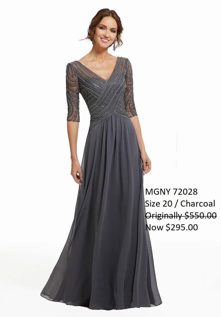 A woman is wearing a long gray dress with a v-neck and sleeves.